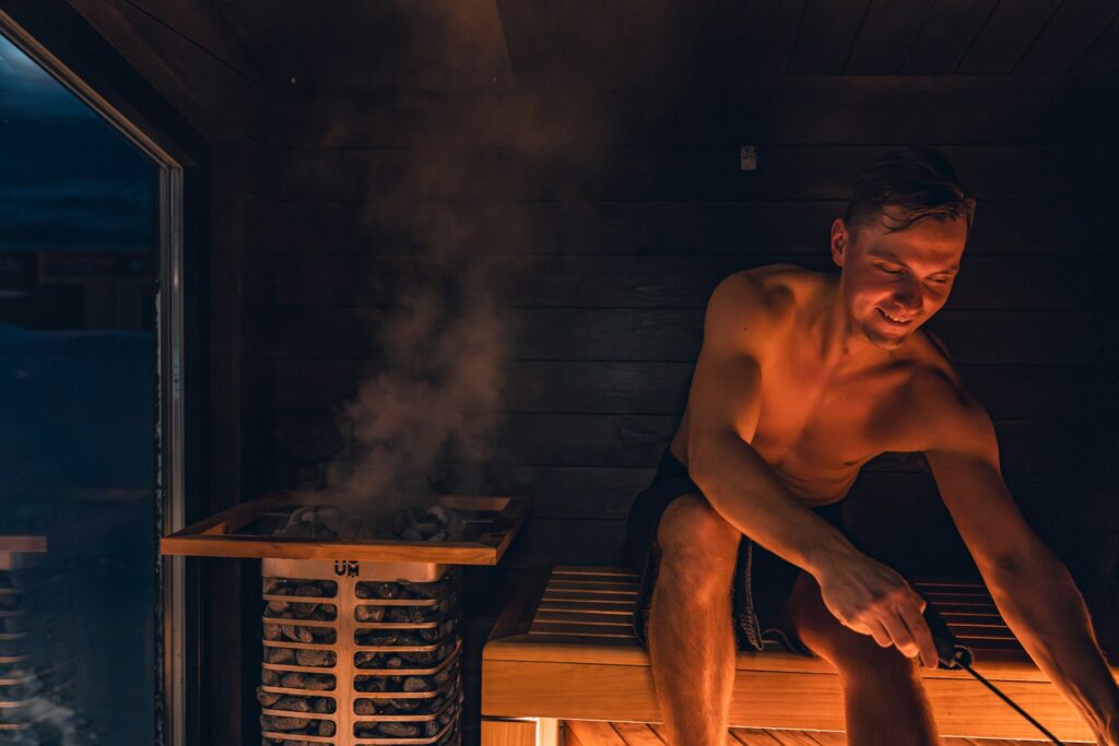 Man enjoying a relaxing time in a sauna.